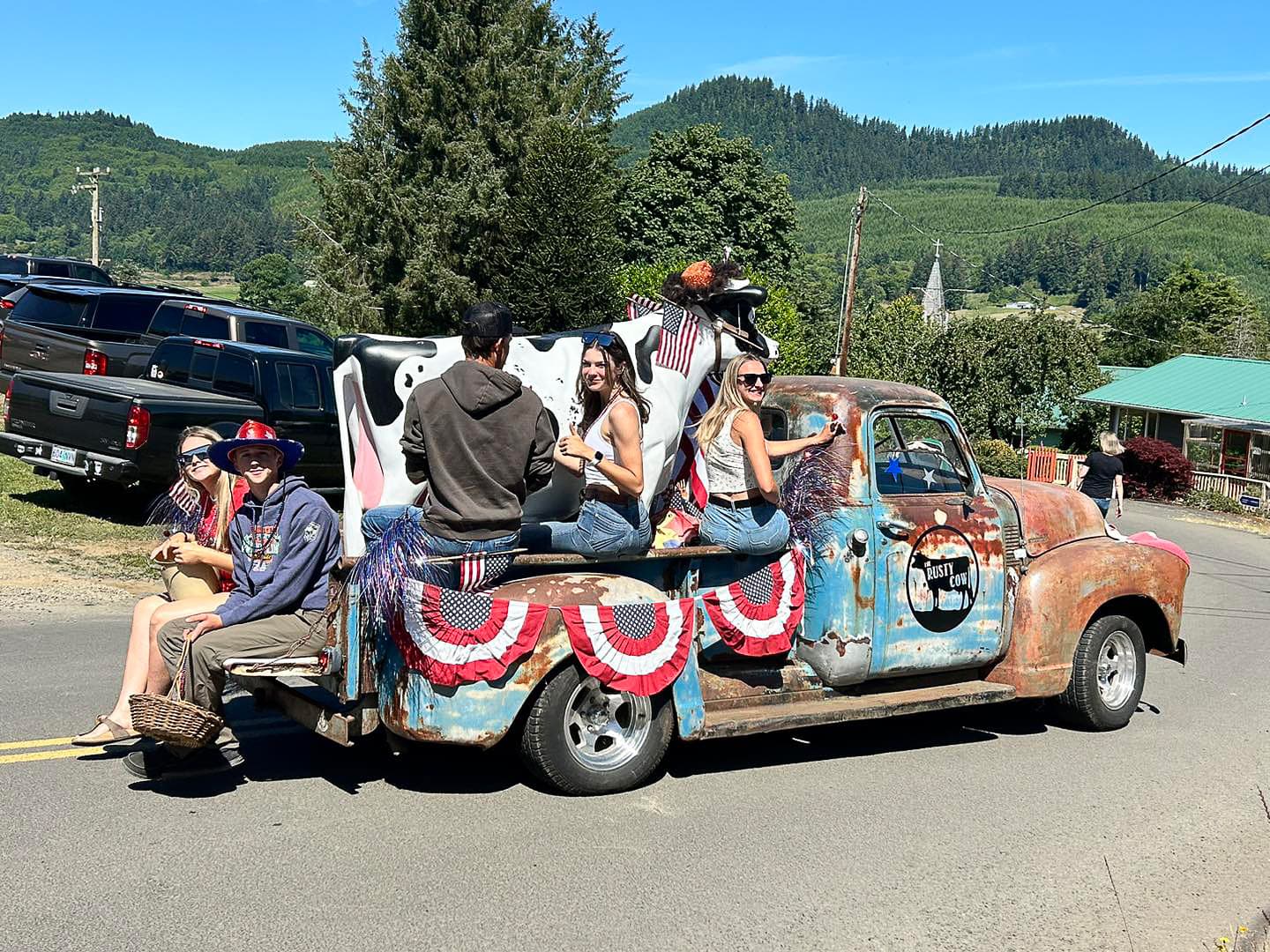 People on a truck at the Clover's Day Celebration